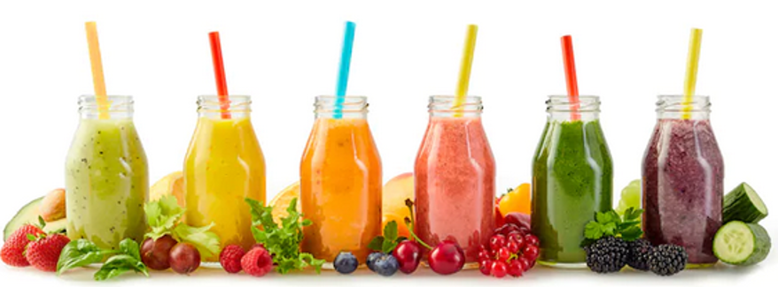 different flavoured smoothies with fruit on white background