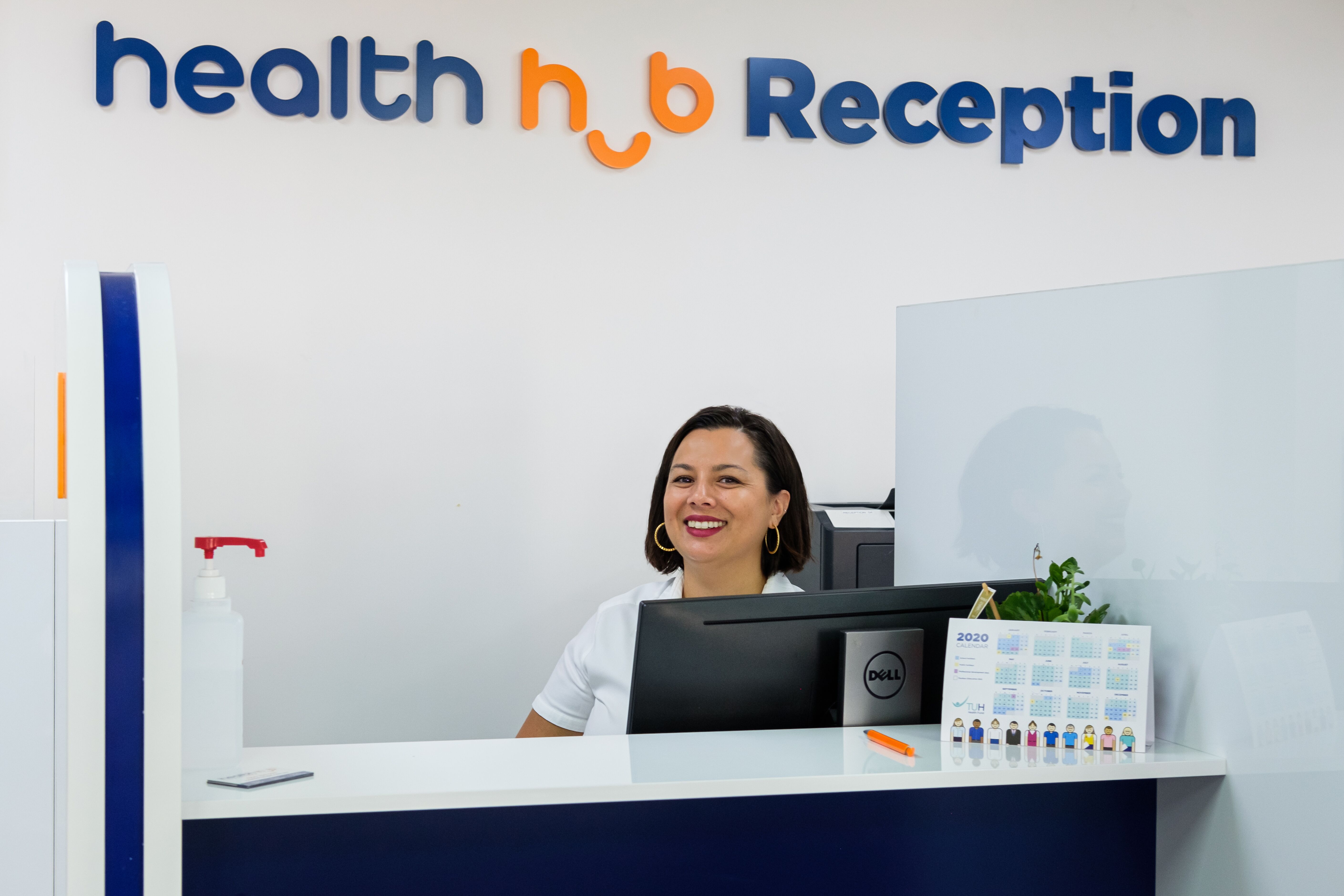 female at Health Hub Fortitude Valley reception
