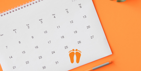 Calendar on orange background for orthotics promotion at The Health Hub Fortitude Valley