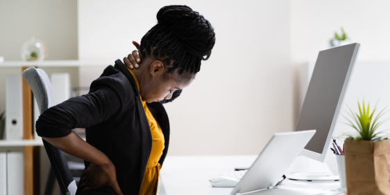 woman with back pain in need of physiotherapy